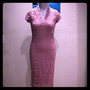 Pink lace plunging neckline.